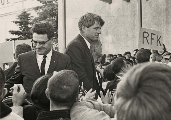 Senator Robert Kennedy with Billie Farnum greeted by OU students